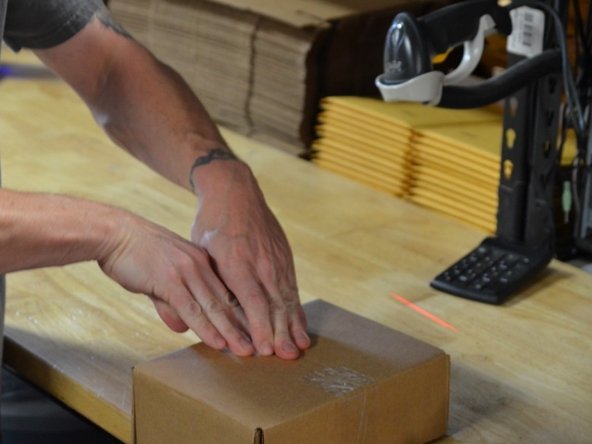 How to Tape a Package for Shipping: step 6, image 1 of 1