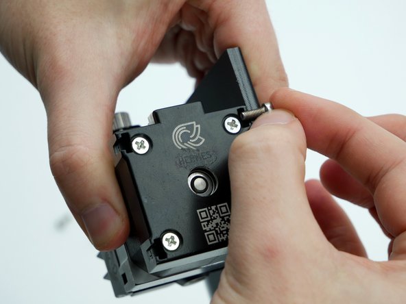 Double check before proceeding that you are using a suitable length screw for the mounting plate thickness used.