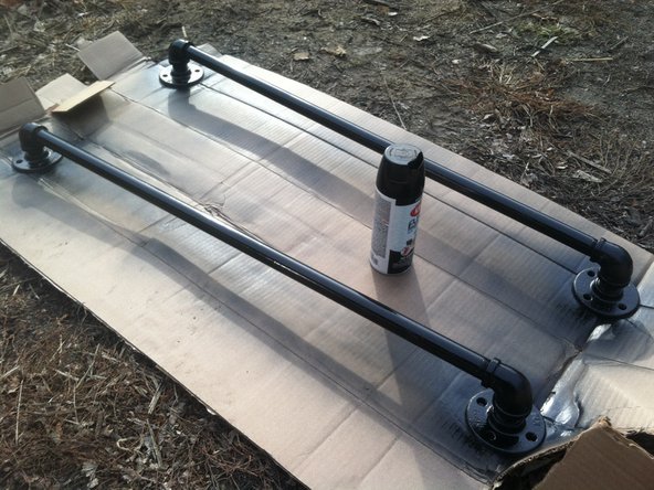 Paint the handrails with a metal-appropriate paint.