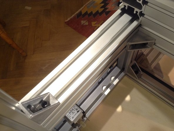 Mount side extrusion above the External Connection Panel, using 2 single brackets.