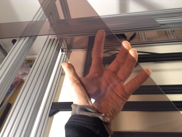 Take the rear window and peel the protective cover.