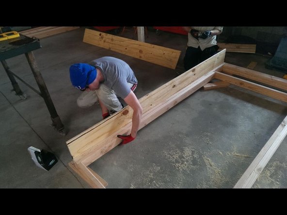 Keep the edge of the plywood flush with the 2x4s, and make sure the bottom is flush, too.