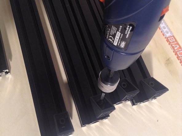 Screw in angle brackets on long members