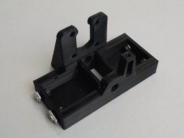 Install 4x M5 x 10 SHCS, M5 Washers and M5 T-nuts into the Z motor mount right as shown.