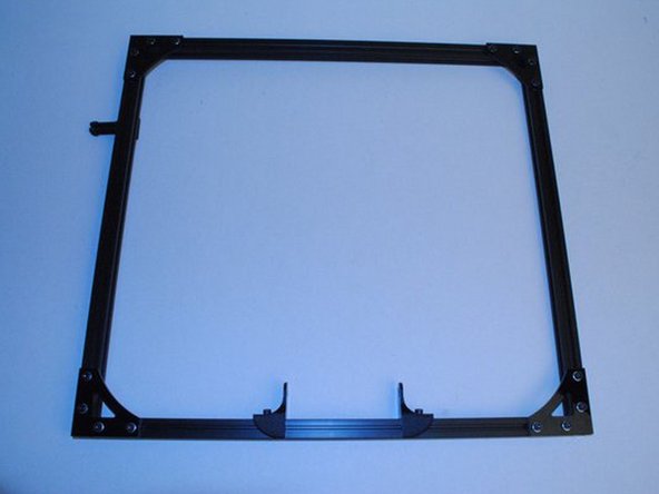 Install 2x M5 t-nuts into the top of the upper extrusion.