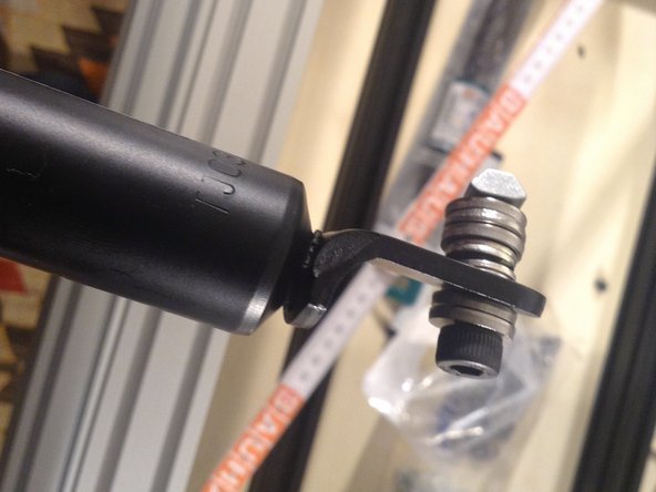 Mount the base end of air spring similarly.