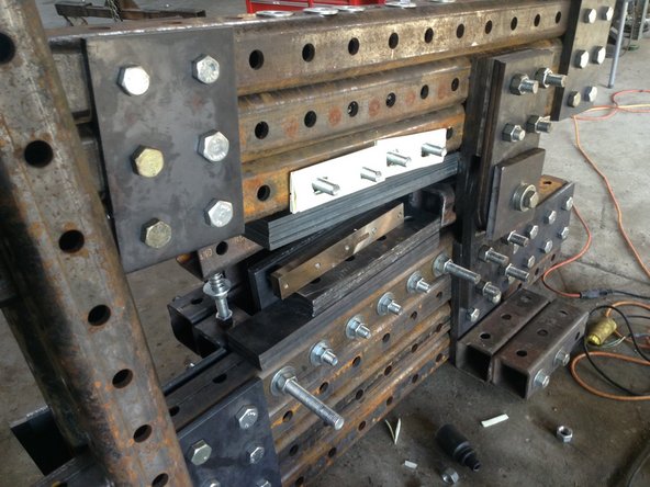 Insert The paper spacer under the blade mount plate