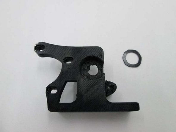 INSTALL EXTRUDER WASHER INTO BODY