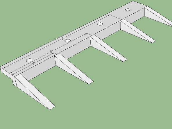 Weld teeth onto the angle iron as shown.  The dimensions are on center.