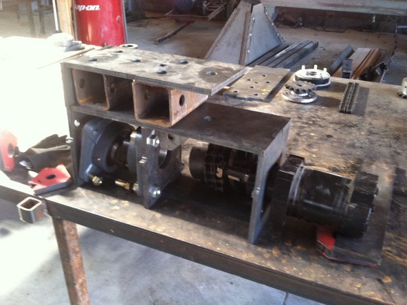 Place hub. Insert nut and pin to hold in place.