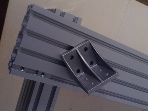 Take a corner bracket. Use the corner bracket with the ridge in the middle.