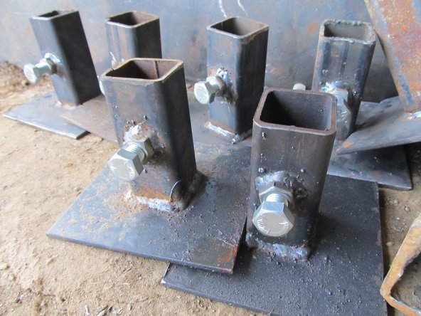 Center the leg holder on the plate, ensuring it is square in all directions.