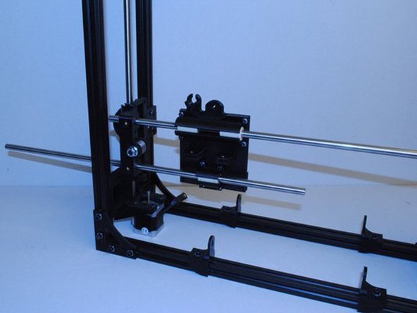 Slide a 10mm rod through one of the two holes in the X end idler.