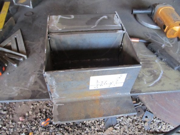 Tack the back piece in a few spots, with a 1" seam on each side.