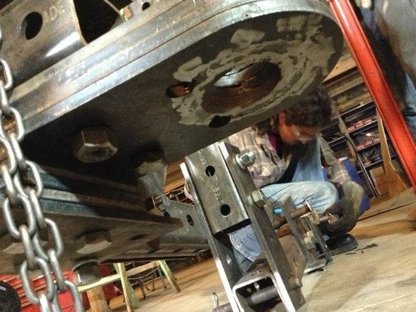 Place Spacer Plates between the Bottom Reinforcement Plate and the Pivot Plates. Bolt these with 6" bolts