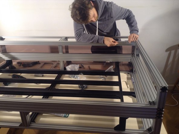 Install 3 hinges - two towards the ends, and one in the middle, by eye.