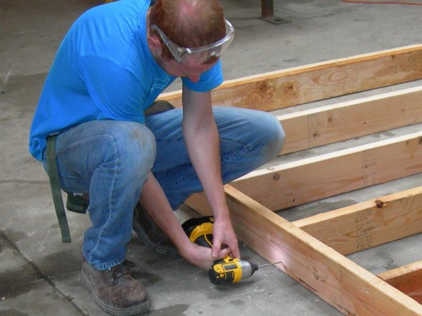 Lay your two pieces with the layout marks on them facing each other and lay your six 6' - 9" pieces in between, roughly in the position of the marks.