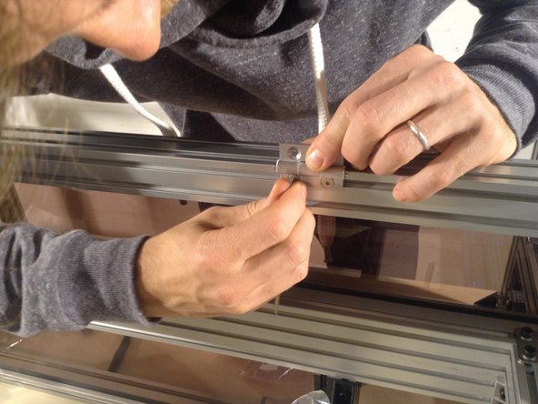 Install 3 hinges - two towards the ends, and one in the middle, by eye.