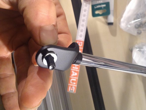 Use 2 larger washers and 5 smaller washers on a 20 mm screw, and then 3 more larger washers.