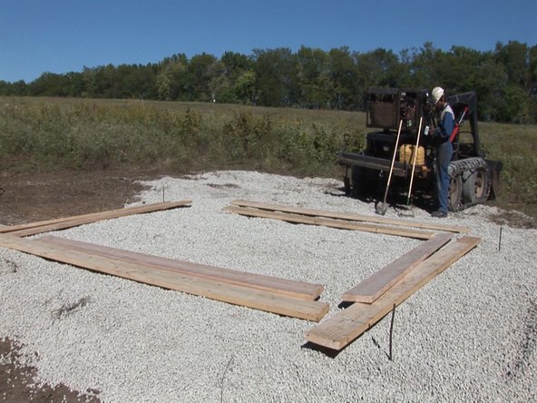 Build foundation forms on pad. Forms are built out of 2x10 lumber.
