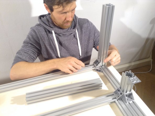 Install rear vertical of overall frame