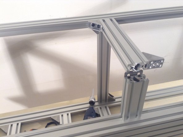 Mount 2040 extrusion - the mid support at the rear of the frame.