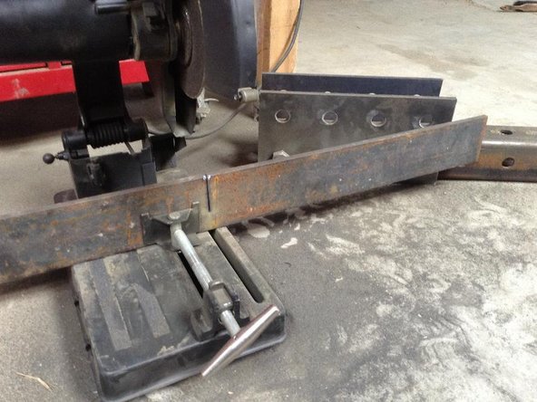 Build the Angled Support (pictured in step 3) from a 24" piece of 1/2"x4" plate.   Punch 2 holes, 2" in from each end and at 20" spacing using a 1-1/16 bit in an open source Ironworker Machine.