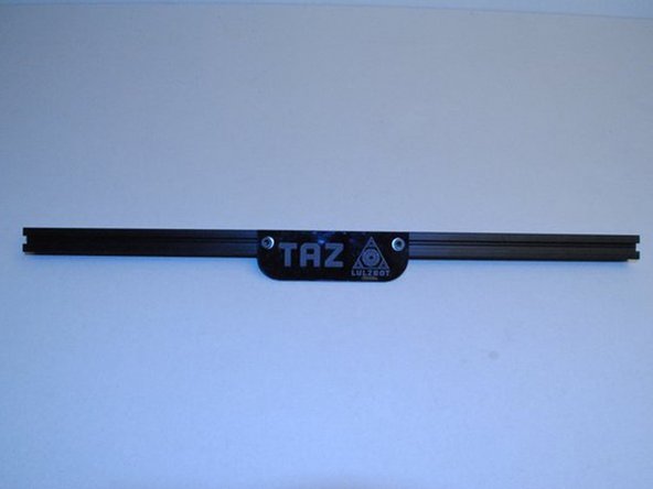 Using the 2x M5 T-nuts in an extrusion that is not tapped, install the name plate with 2x M5 x 10 SHCS and M5 Washers.