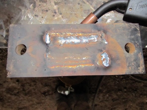 Lower the  cylinder and flip it upside down.