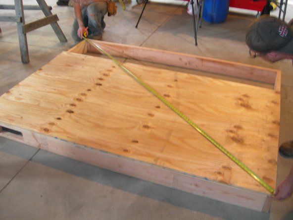 Before screwing down the sheathing, double-check to make sure that frame is square by measuring the diagonals.