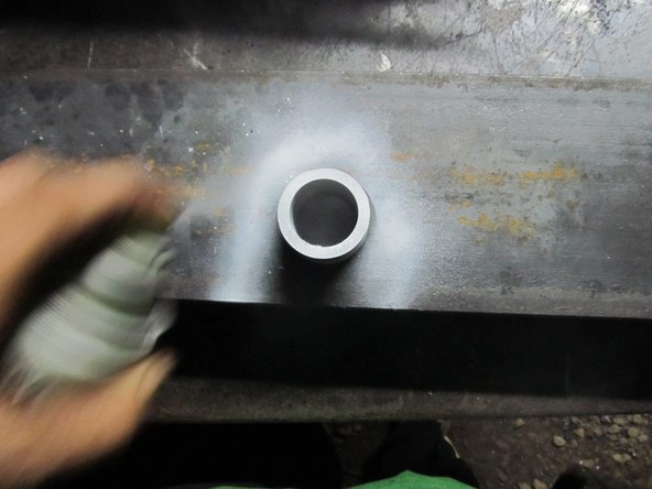 Put the top member on, and put in at least 3 bolts. Spray mark this location as well, from the other side.