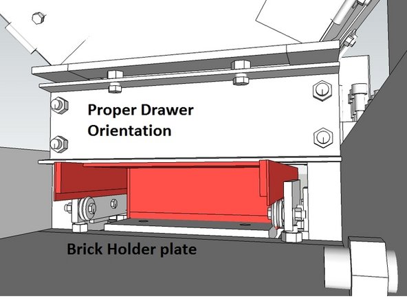 Insert the drawer into the chamber as shown, in the fully retracted position. Its important that it be in the right orientation.