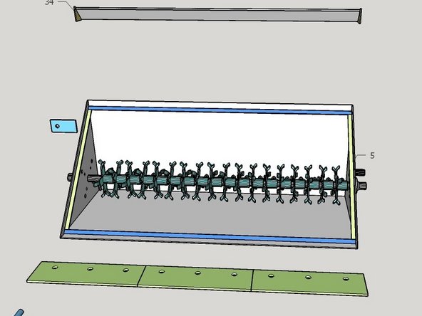 Pass the shaft P21 through one bearing, with the drilled bolt hole on the right end. Place the tine modules onto the shaft as it is being passed through.