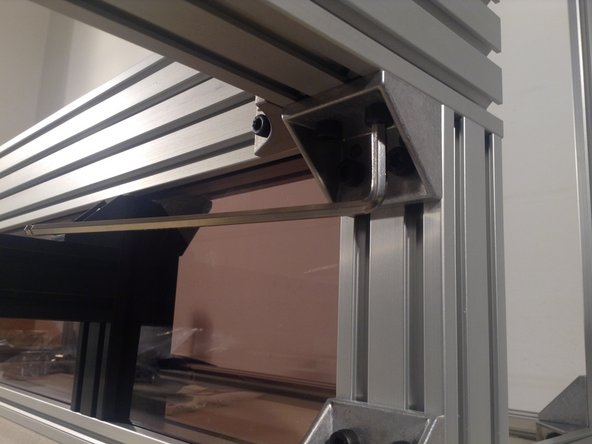 Tighten down the gantry frame to the bottom outer frame. Start with the 4 corners.