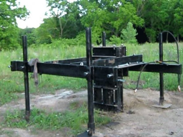 Torch the holes in the frame through the holes in the primary arms.