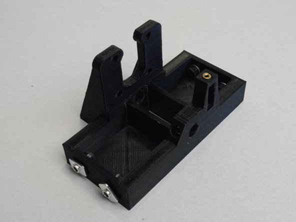 Install 4x M5 x 10 SHCS, M5 Washers and M5 T-nuts into the Z motor mount left as shown.