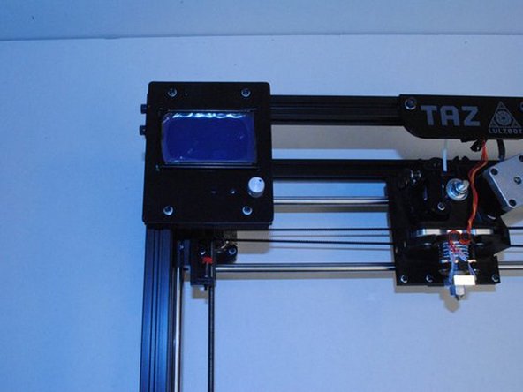 Using 4x M3 x 12 SHCS and M3 Washers, attach the LCD cover.