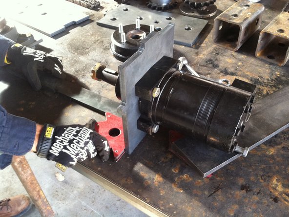 Attach motor to plate. (insert part number)