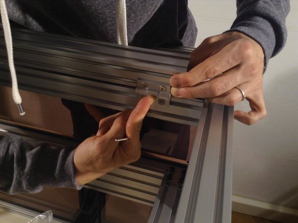 When mounting the 4040 extrusion - push it all the way up so that hinges can close fully. The hinges must pushed as far to the corner of the extrusion as possible.