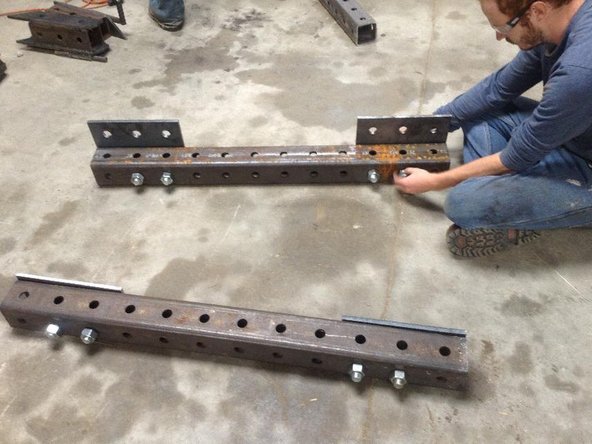 Take two 12-hole steel tubes.  These will be used to mount the Quick Attach.