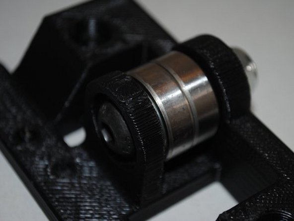 Install 2 608 Bearings with the M8 x 35 BHCS, M8 washers and M8 Nyloc nut.