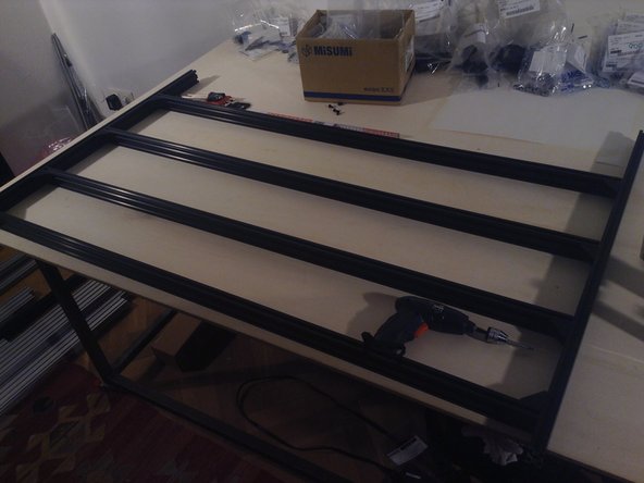 Attach long members to shorter members of the frame. Make front offset 54 mm, and rear offset 194 mm to edge.