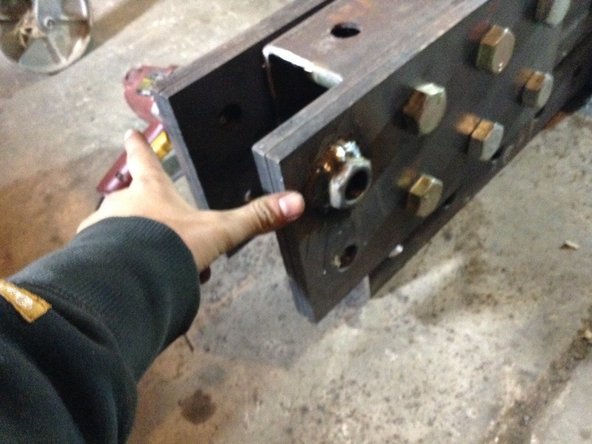 Weld the drilled out nuts to the plates where shown.