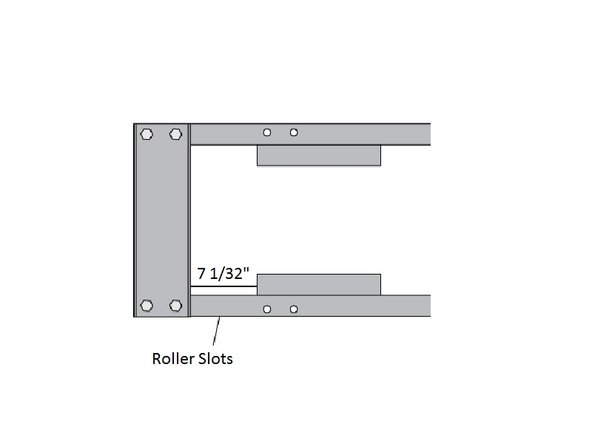 With the frame laid down, and one of the drawer members under it to support the spacers, place the spacers on each side.