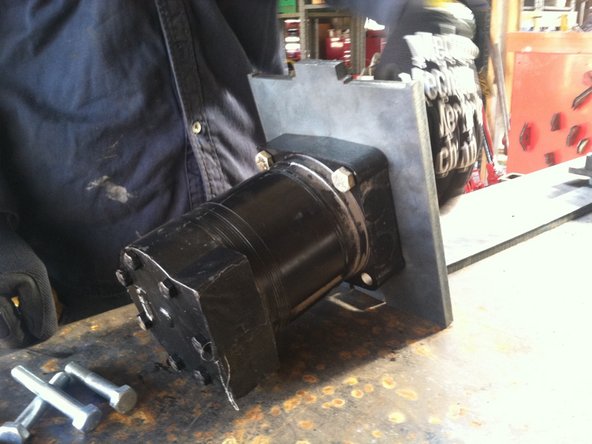 Attach motor to plate. (insert part number)