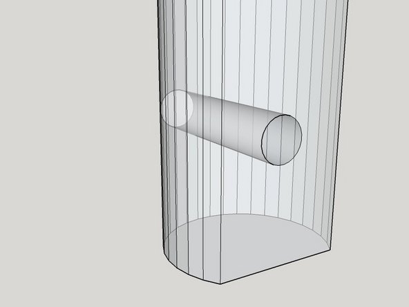 Place the 6 spline coupler on the shaft, and use it as a guide to guide your drill bit. Start drilling the hole radially through the shaft for the bolt, starting from the flattened side of the shaft. After the hole is started, remove the coupler and continue, to avoid damaging the coupler.