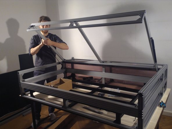 Select the position of base end such that the door is open to a comfortable height at the maximum spring extension.