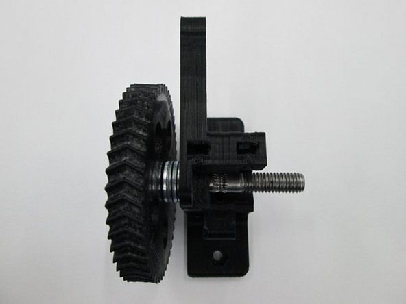 Install 4 x M8 washers onto the hobbed bolt then a 608 bearing.