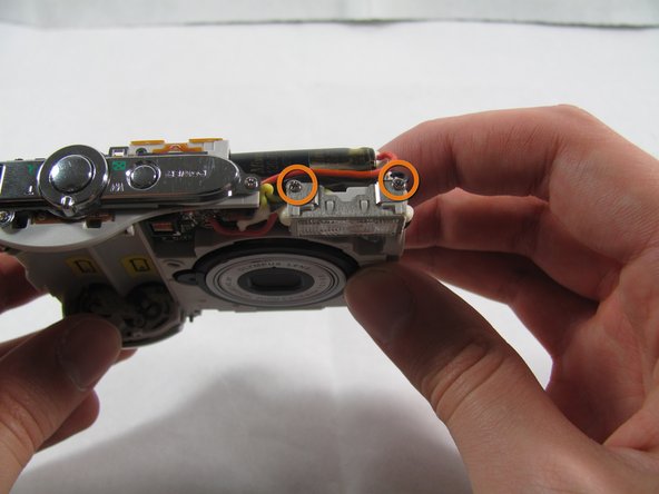 Removing Olympus FE-210 Flash Assembly: step 7, image 1 of 2