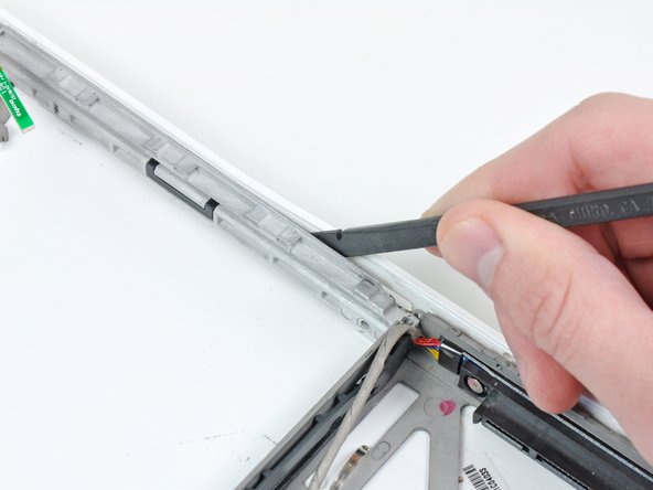 MacBook Core 2 Duo Optical Drive Bezel Replacement: step 27, image 1 of 2